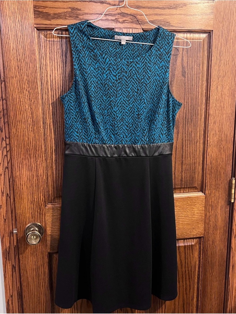 Sleeveless Teal Pattern Fit & Flare Dress with Black Skirt